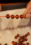 Noeud entre les perles